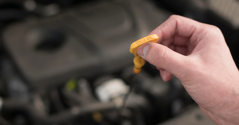 A yellow dipstick.
